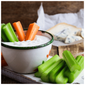 Carrots and celery sticks with dip